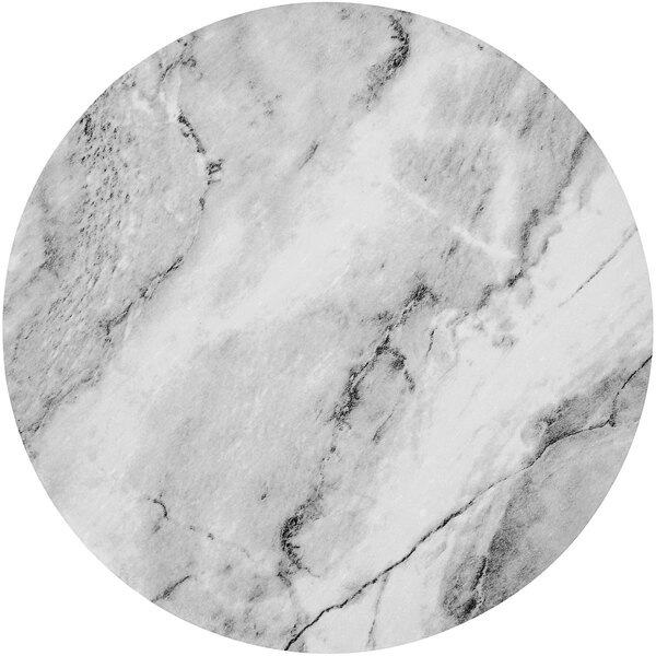 An Enjay round cardboard cake board with a white marble surface and black veins.