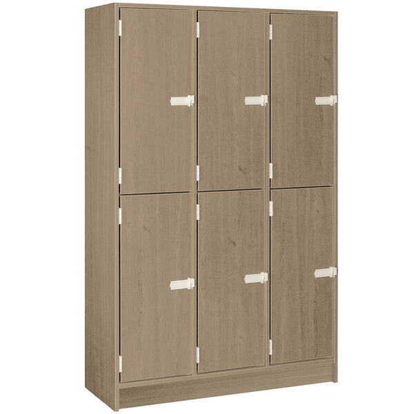 A wooden I.D. Systems locker with three doors and a middle shelf.