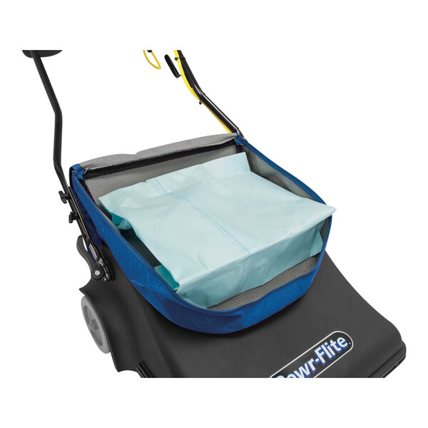 A blue bag in a Powr-Flite wide area vacuum cleaner.