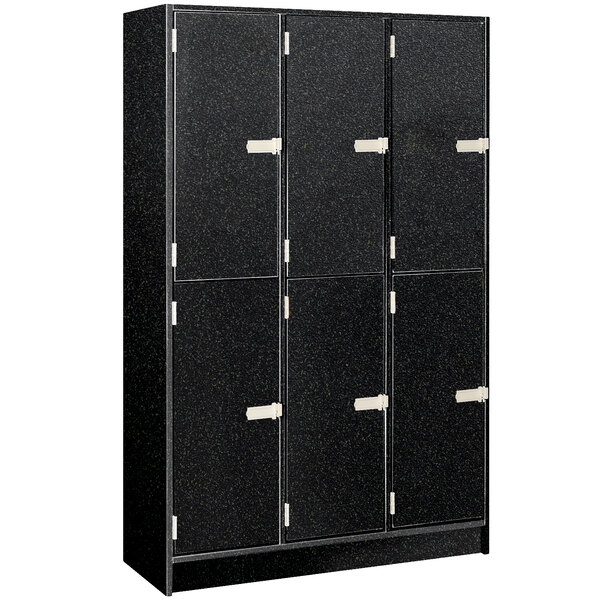 A black metal I.D. Systems locker with white handles on the doors.