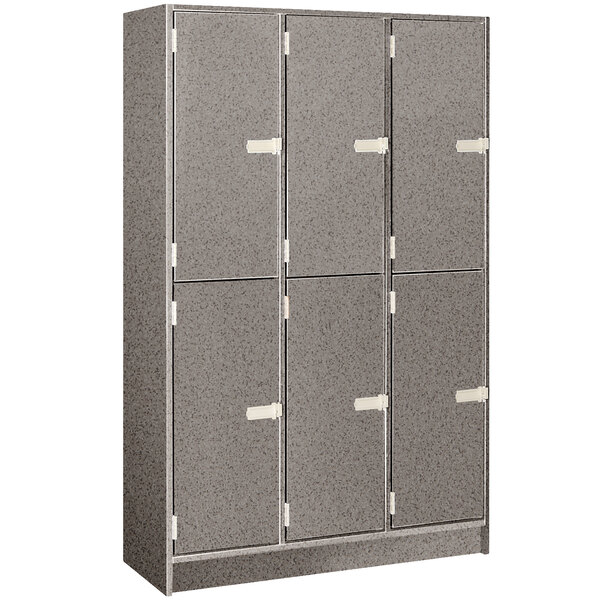 A grey metal locker with four doors and a middle shelf.