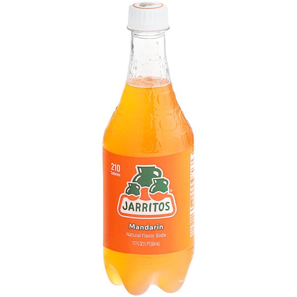 A close up of a Jarritos Mandarin Soda bottle.