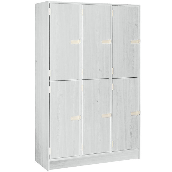 A grey metal triple door locker with metal handles.