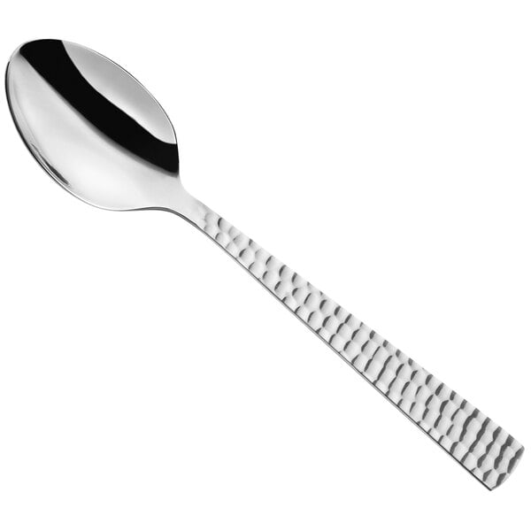 An Amefa stainless steel spoon with a textured handle.