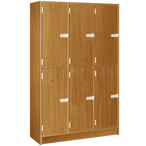 A light oak wooden triple door locker with a middle shelf.