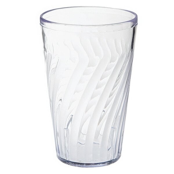 A clear plastic tumbler with a curved design.