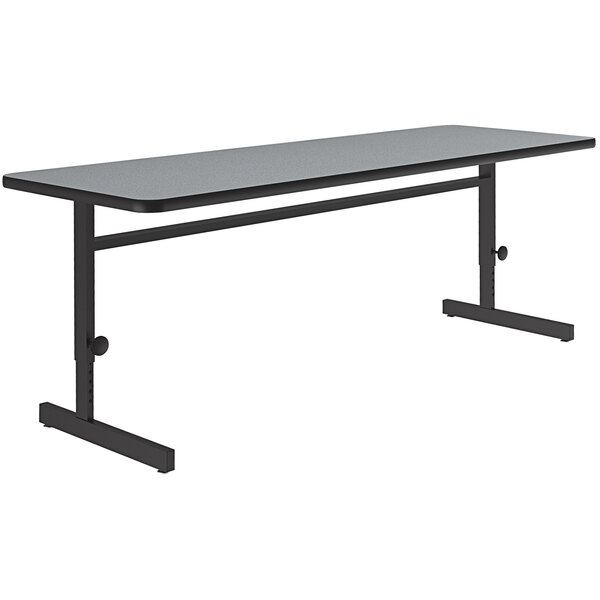 A grey rectangular Correll computer and training table with black metal legs.