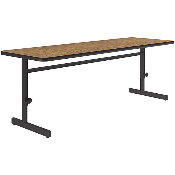 A Correll rectangular training table with black metal legs.