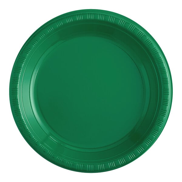 A close-up of a Creative Converting emerald green plastic plate with a rim.