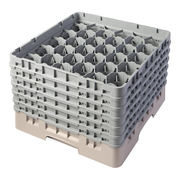 A beige plastic Cambro glass rack with extenders.