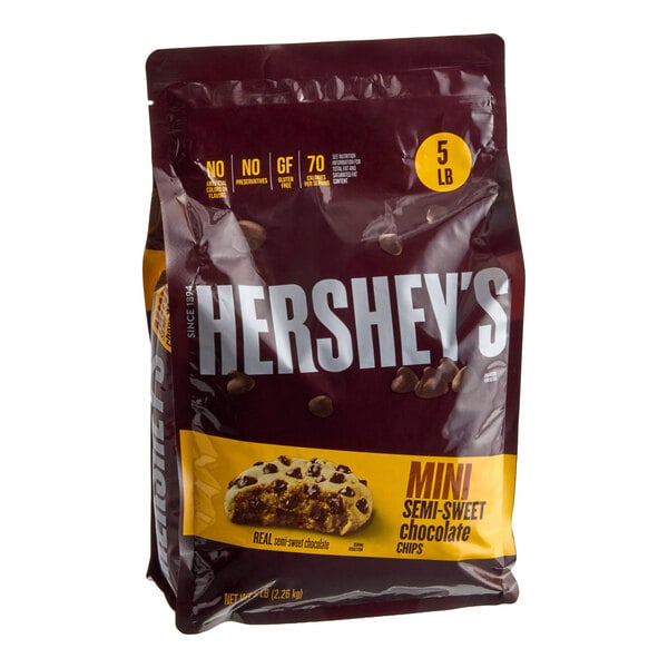 A 5-pound resealable bag of HERSHEY'S semi-sweet mini chocolate baking chips.