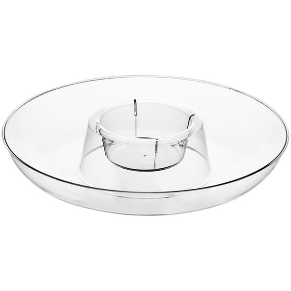 A clear plastic circular plate with a small dip well in the middle.