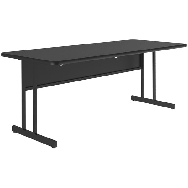 A black rectangular Correll desk with black legs and a black granite finish top.