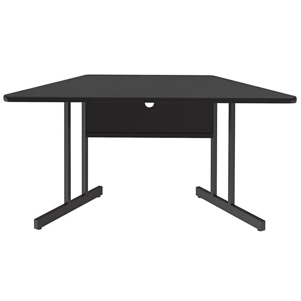 A black trapezoid table with a black granite finish.