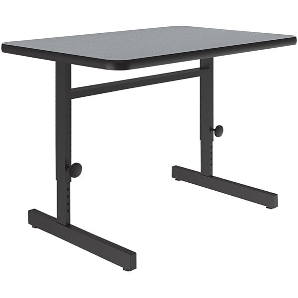 A grey rectangular Correll computer and training desk with adjustable metal legs.
