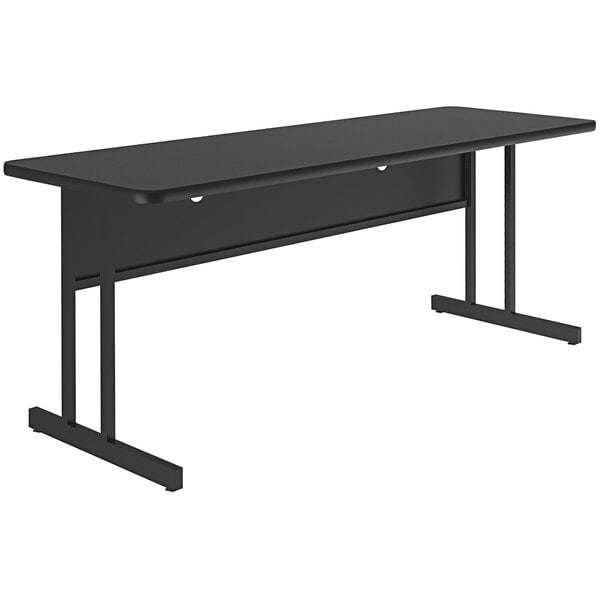 A black rectangular Correll desk with legs.