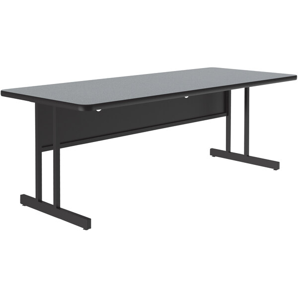 A black rectangular desk with a gray granite top and black legs.