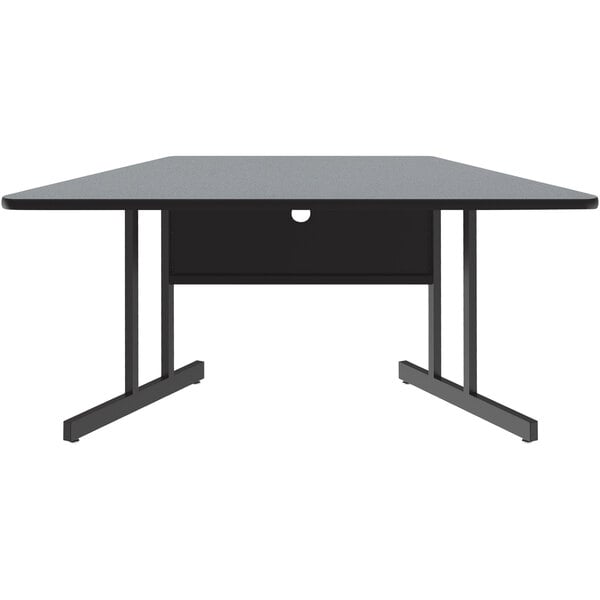 A black trapezoid table with a gray granite finish top.