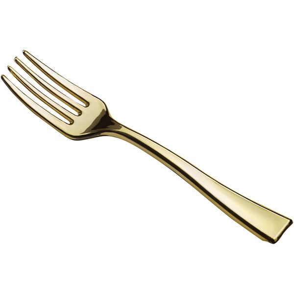 A close-up of a Visions gold plastic tasting fork.