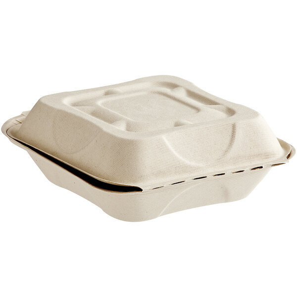 A World Centric compostable fiber clamshell container with a lid.