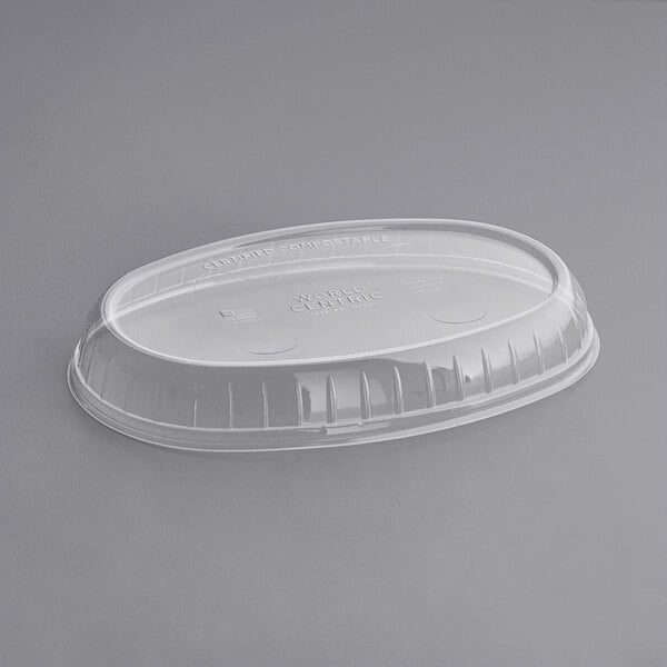 The clear World Centric burrito bowl lid on a plastic container.