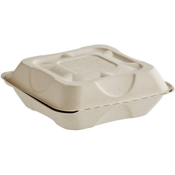 A white World Centric compostable fiber to-go container with a lid.
