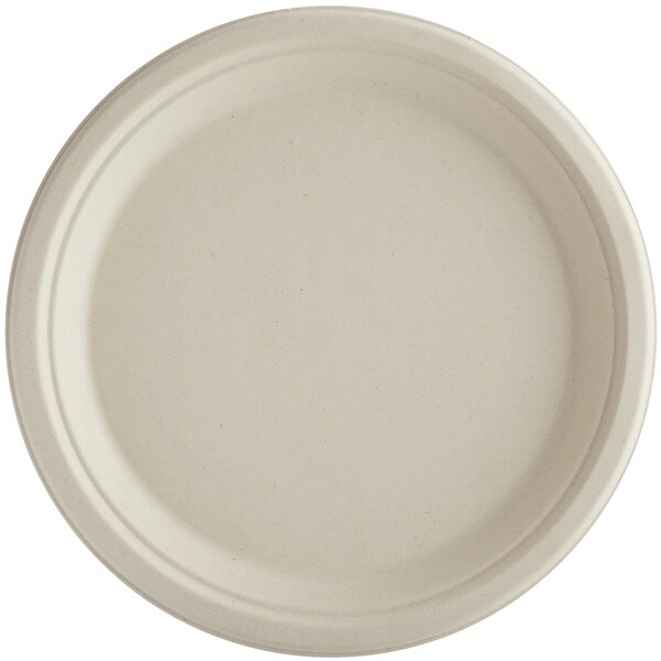 A close-up of a World Centric round compostable fiber plate with a small round edge.