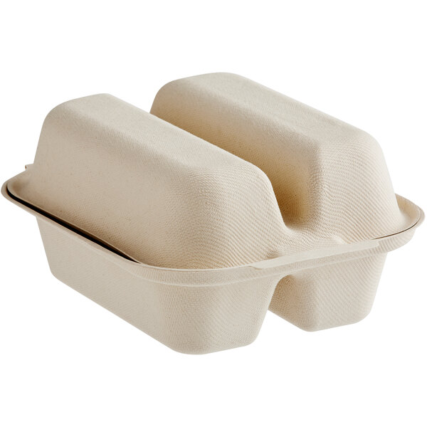 A World Centric white compostable fiber clamshell container with two compartments.