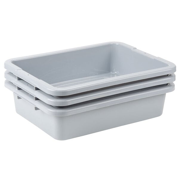A stack of three Rubbermaid gray polyethylene utility bins.