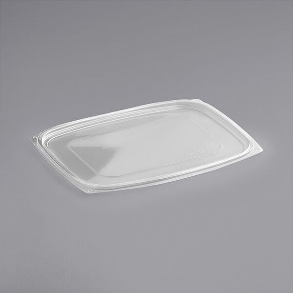 A World Centric clear plastic lid on a plastic container.
