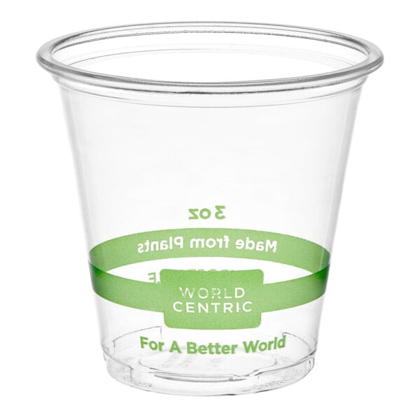 A clear 3 oz. compostable portion cup made from PLA with green labeling, branded as World Centric.