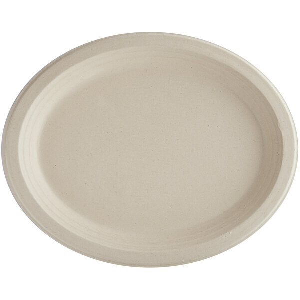 A white World Centric oval compostable fiber plate with a plain edge.