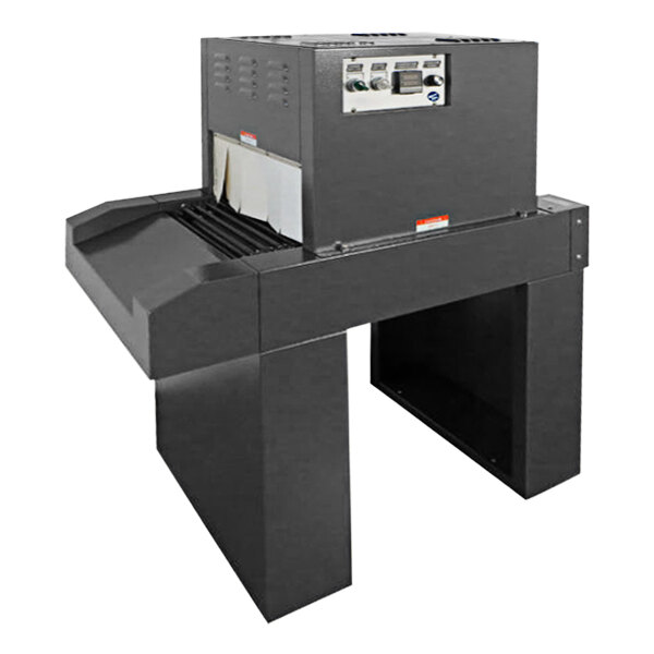 A large black Sealer Sales shrink tunnel machine with white buttons.