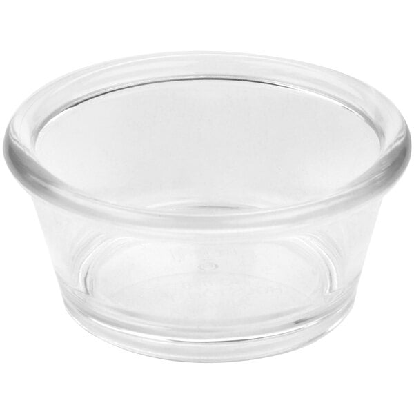 A close-up of a clear plastic GET ramekin.