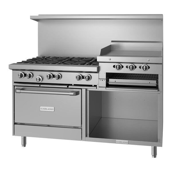 A large stainless steel Garland range with 6 burners, a raised griddle, and storage base.