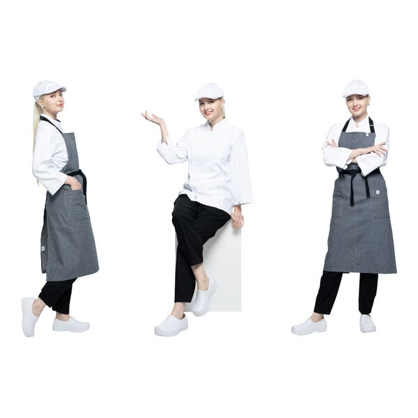 Three people are shown wearing white caps, white jackets, black pants, and white slip-on clogs, with two of them also wearing gray aprons.