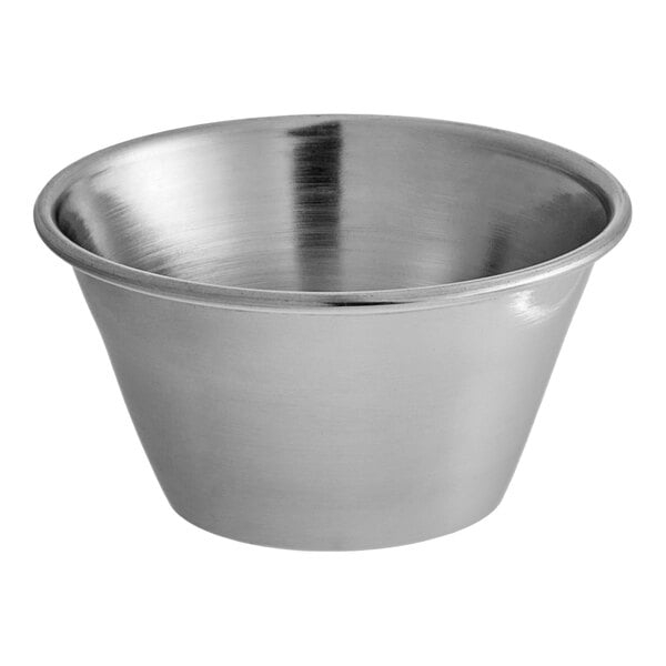 A silver stainless steel GET condiment cup.