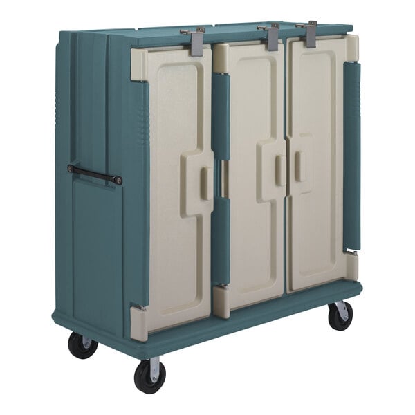 A Cambro slate blue plastic meal delivery cart with a white door.