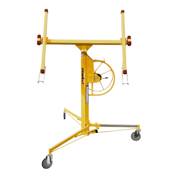 A yellow metal structure with wheels.