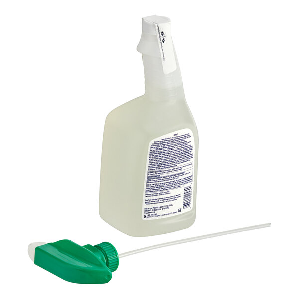 A close-up of a Comet Disinfecting Bathroom Cleaner bottle with a foil seal.