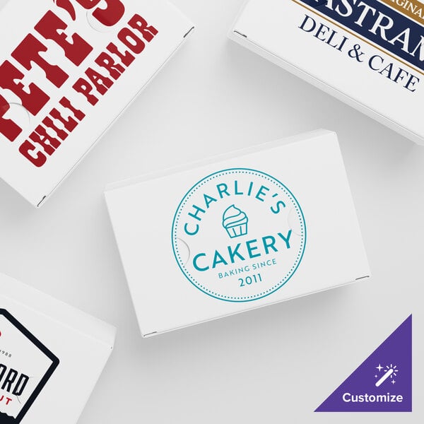 A white Choice take-out box with a blue Charlie's Bakery logo.