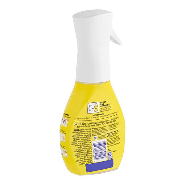 A yellow bottle of Mr. Clean Clean Freak All-Purpose Spray with a white cap.