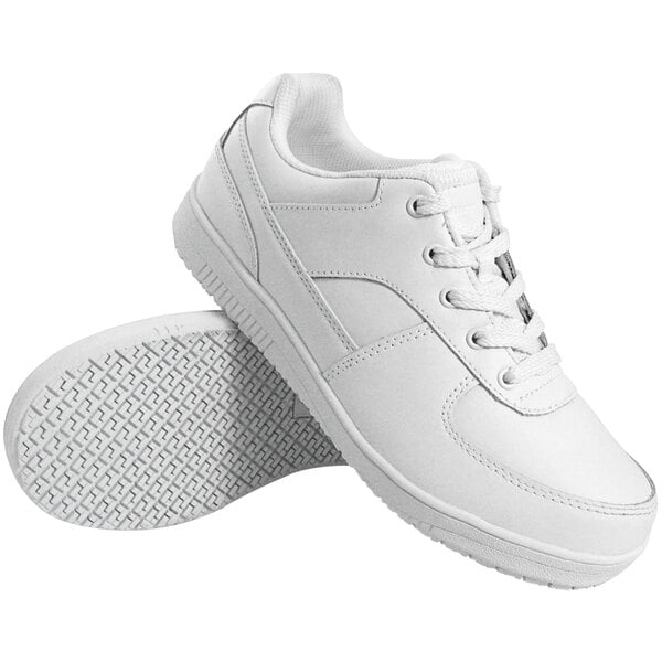 A pair of Genuine Grip white leather shoes.