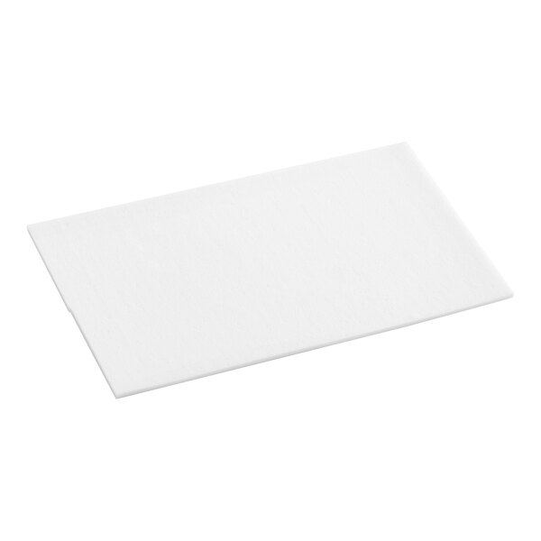 A white rectangular Mr. Clean Magic Eraser Sheet.