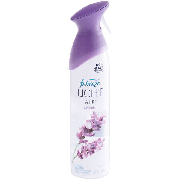 A close-up of a white Febreze Air Light lavender spray bottle with a purple cap.