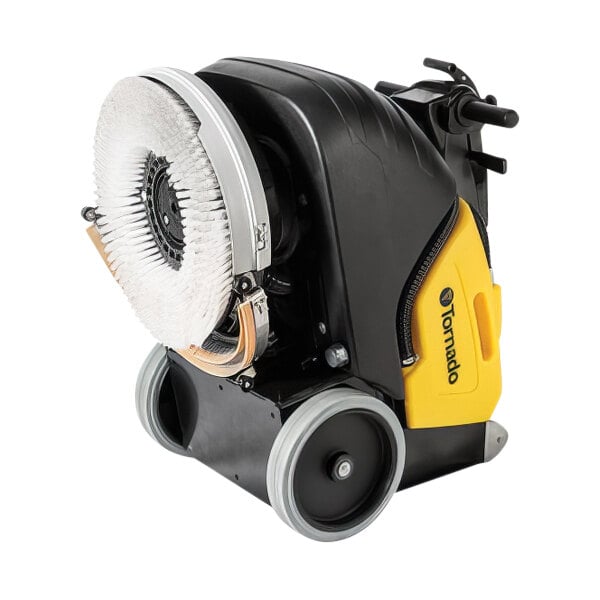 A black and yellow Tornado walk behind floor scrubber with wheels.