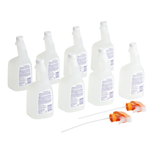 A close-up of a white Febreze Professional bottle with a blue label.