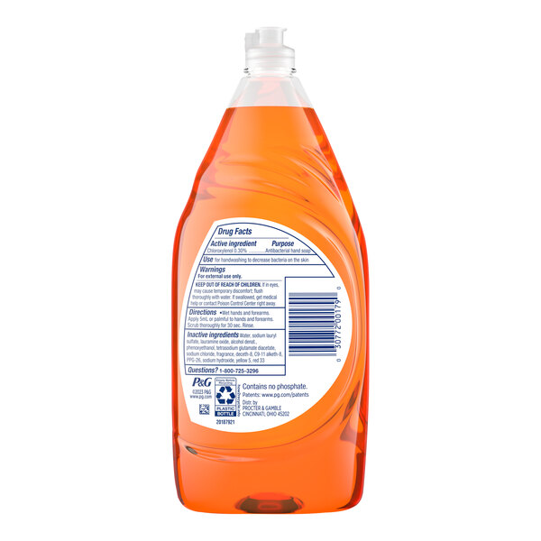 A close-up of a white bottle of Dawn Ultra Antibacterial Orange dish soap with a white label.