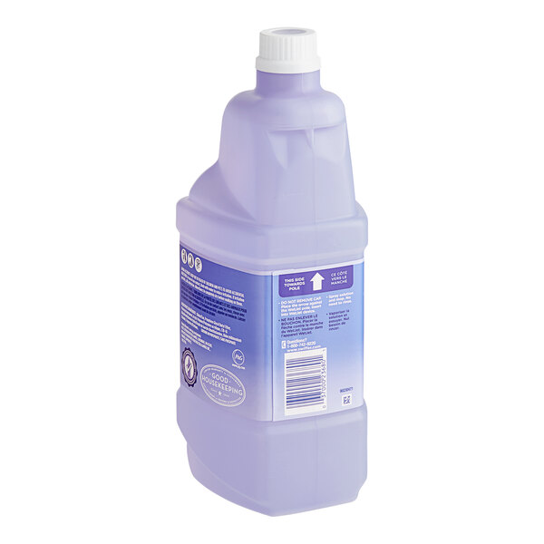A close-up of a purple Swiffer WetJet multi-surface cleaner solution refill bottle.