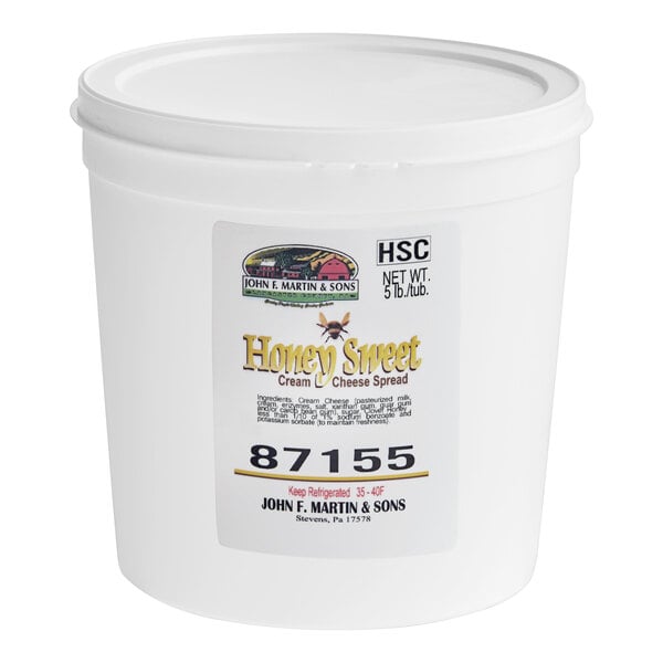 A white container of Sweet Honey Cream Cheese Spread.